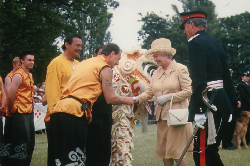 Master Iain with the Queen of England