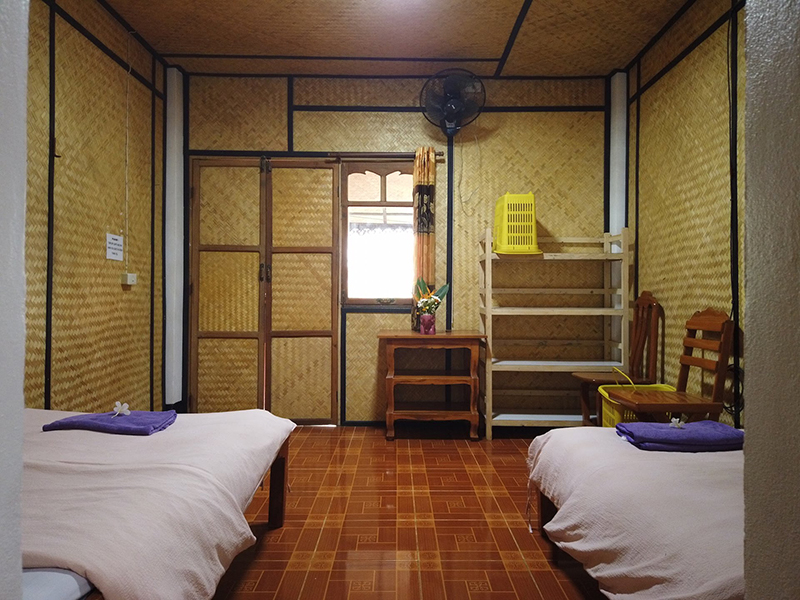 Shared Room Entrance featuring Shelf, Desk, chairs, and fan,