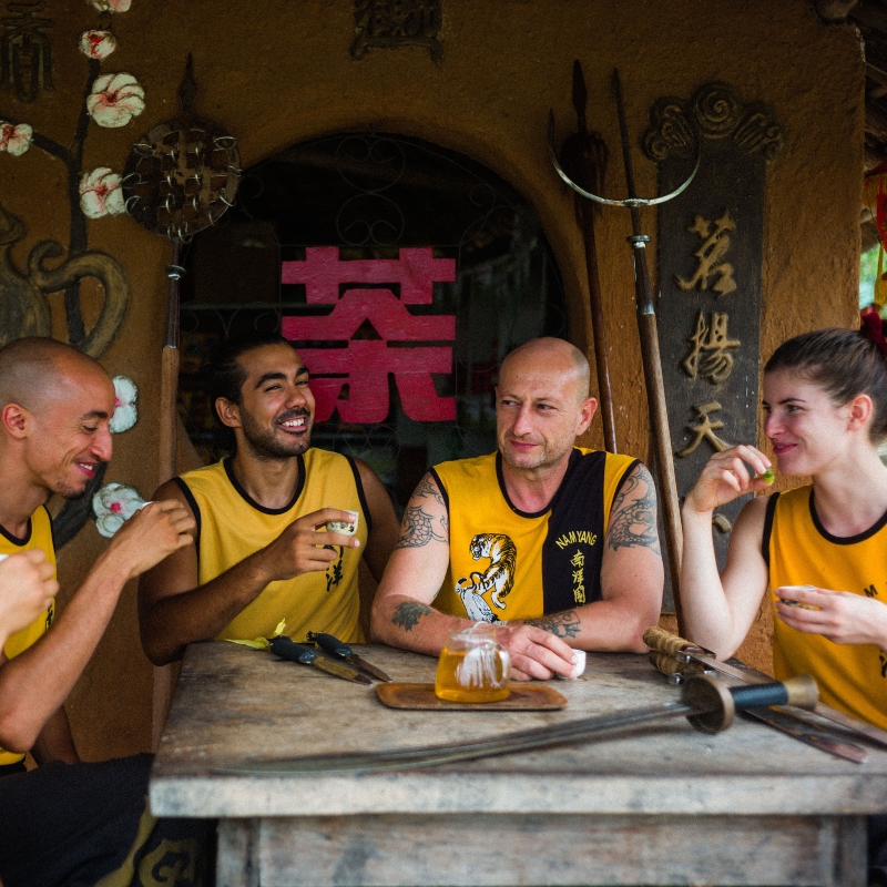 Instructors having tea with Master Iain Armstrong