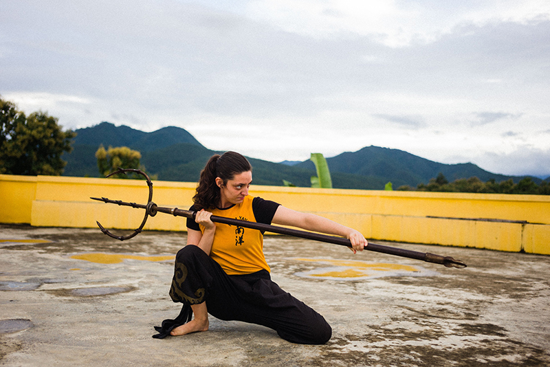 Instructor Emily performing the Tiger Fork